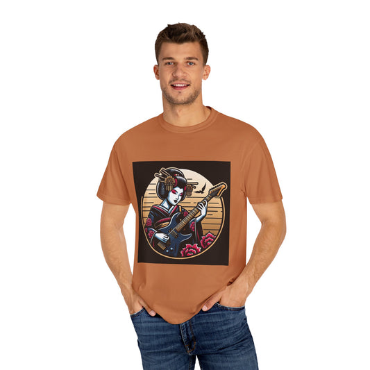 Man wearing a brown t-shirt with a graphic design of a woman playing guitar on a black background