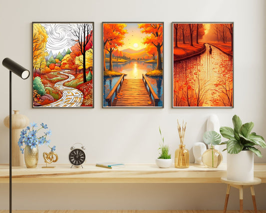 Three framed landscape paintings on a wall above a wooden shelf with decorative items.